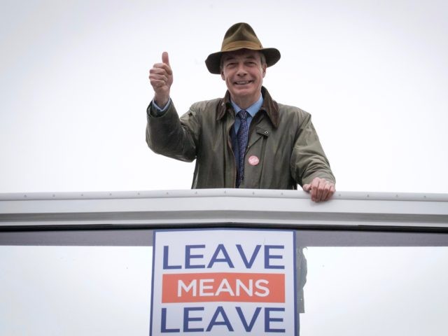 BOURNEMOUTH, ENGLAND - OCTOBER 15: MEP and former leader of the UK Independence Party (UKIP) Nigel Farage leaves on the 'Leave Means Leave' bus following a walkabout at Christchurch street market ahead of the 'Leave Means Rally' this evening on October 15, 2018 in Bournemouth, England. Leave Means Leave is …
