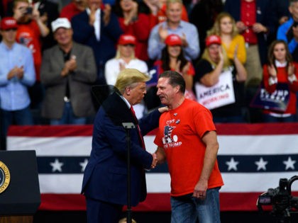 MINNEAPOLIS, MN - OCTOBER 10: U.S. President Donald Trump shakes hands with Minneapolis Police Union head Bob Kroll on stage during a campaign rally at the Target Center on October 10, 2019 in Minneapolis, Minnesota. The rally follows a week of a contentious back and forth between President Trump and …