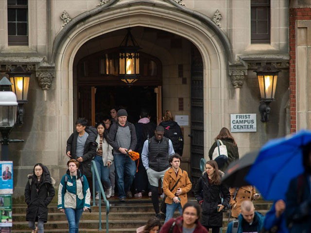 PRINCETON, NJ - FEBRUARY 04: Students exit a building between classes at Princeton University on February 4, 2020 in Princeton, New Jersey. The university said over 100 students, faculty, and staff who recently traveled to China must 'self-isolate' themselves for 14 days to contain any possible exposure to the novel …