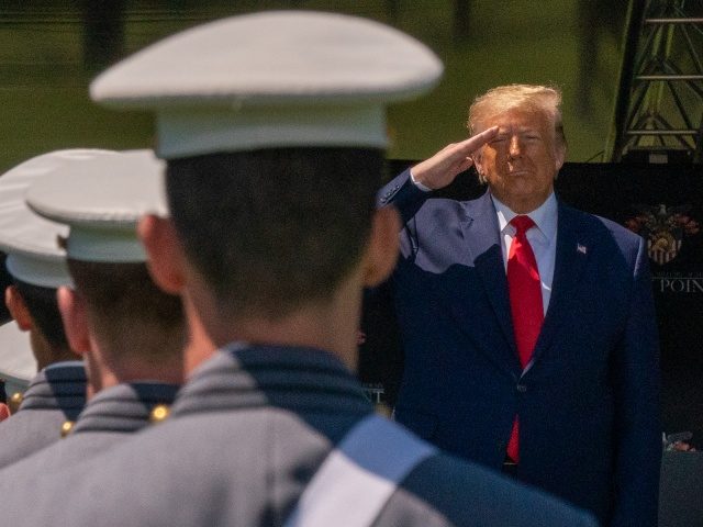 WEST POINT, NY - JUNE 13: U.S. President Donald Trump salutes cadets at the beginning of the commencement ceremony on June 13, 2020 in West Point, New York. The graduating cadets were sent home in March due to the COVID-19 pandemic, but have been ordered back to attend the commencement …