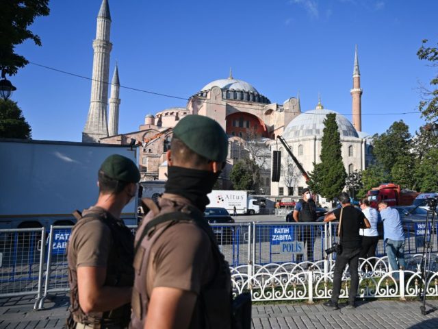 Turkish special force police officers patrol in front of Hagia Sophia during the preparati