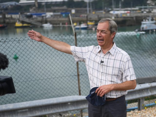DOVER, ENGLAND - AUGUST 12: Brexit Party leader Nigel Farage speaks to supporters and media on August 12 2020 in Dover, England. Favourable weather conditions in recent weeks have led to a rise in people attempting to cross the channel, with more than 200 people arriving on the Kent coast …