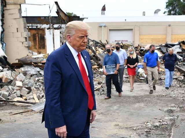 US President Donald Trump tours an area affected by riots in Kenosha, Wisconsin on September 1, 2020.