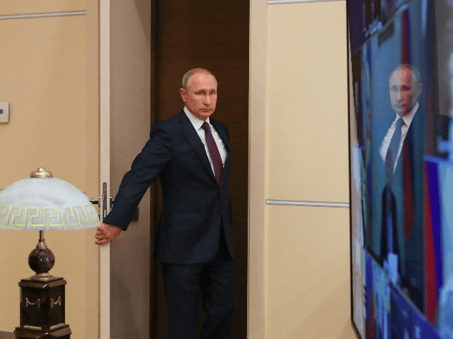 Russian President Vladimir Putin arrives for a meeting with members of the Security Counci