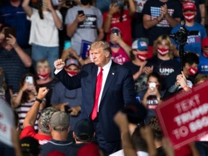 WINSTON SALEM, NC - SEPTEMBER 08: President Donald Trump addresses the crowd during a campaign rally at Smith Reynolds Airport on September 8, 2020 in Winston Salem, North Carolina. The president also made a campaign stop in South Florida on Tuesday. (Photo by Sean Rayford/Getty Images)