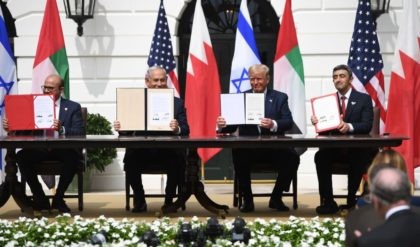 (L-R)Bahrain Foreign Minister Abdullatif al-Zayani, Israeli Prime Minister Benjamin Netanyahu, US President Donald Trump, and UAE Foreign Minister Abdullah bin Zayed Al-Nahyan hold up documents as they participated in the signing of the Abraham Accords where the countries of Bahrain and the United Arab Emirates recognize Israel, at the White …