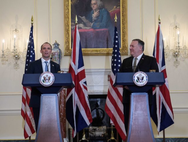 British Foreign Secretary Dominic Raab (L) speaks at a press conference with US Secretary