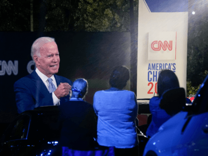 Audience members listen as Democratic presidential nominee and former Vice President Joe Biden participates in a CNN town hall event on September 17, 2020 in Moosic, Pennsylvania. Due to the coronavirus, the event is being held outside with audience members in their cars. Biden grew up nearby in Scranton, Pennsylvania. …