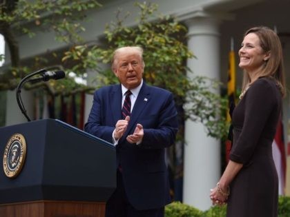 US-VOTE-COURT-TRUMP-BARRETT US President Donald Trump announces his US Supreme Court nominee, Judge Amy Coney Barrett (R), in the Rose Garden of the White House in Washington, DC on September 26, 2020. - Barrett, if confirmed by the US Senate, will replace Justice Ruth Bader Ginsburg, who died on September 18. (Photo …