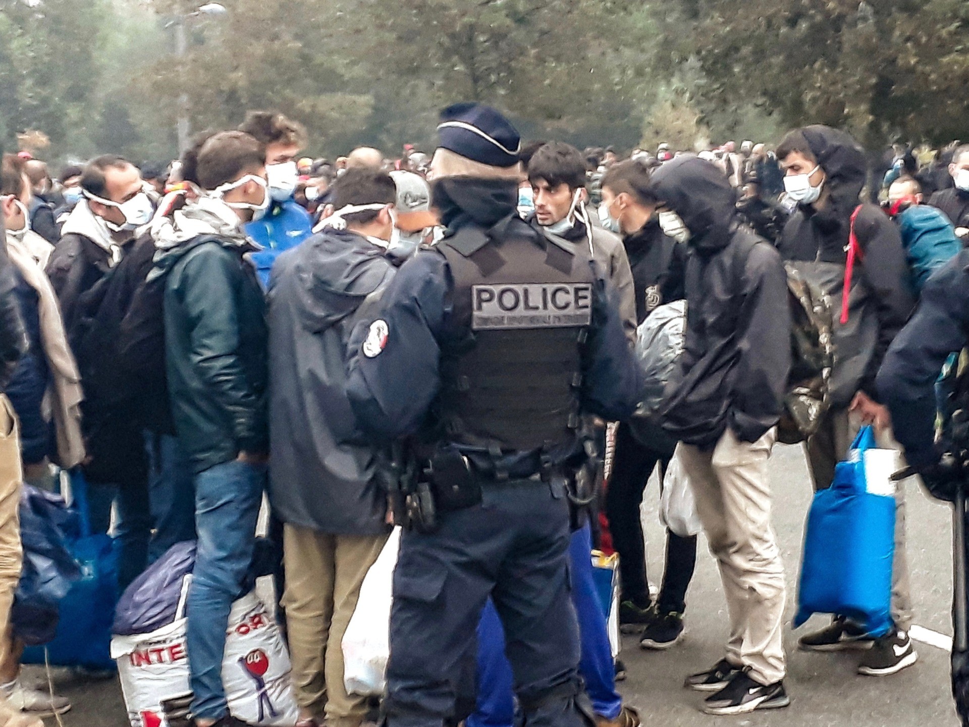 French police evacuate some 800 migrants after they dismantled their camp located near the hospital in Calais, northern France, on September 29, 2020. (Photo by Bernard BARRON / AFP) (Photo by BERNARD BARRON/AFP via Getty Images)