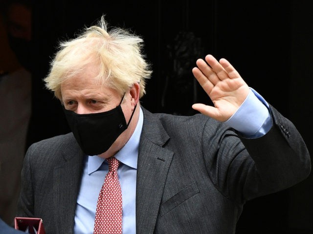 LONDON, ENGLAND - SEPTEMBER 30: Prime Minister, Boris Johnson wearing a face mask leaves Downing Street for PMQs on September 30, 2020 in London, England. The Prime Minister will lead a Covid-19 briefing later after the UK recorded the highest number of daily coronavirus cases since the begining of the …