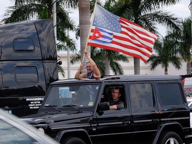 Cuban Americans in Miami's Little Havana celebrate the death of longtime Cuban leader Fidel Castro on November 26, 2016. Cuba's socialist icon and father of his country's revolution Fidel Castro died on November 25 aged 90, after defying the US during a half-century of ironclad rule and surviving the eclipse …