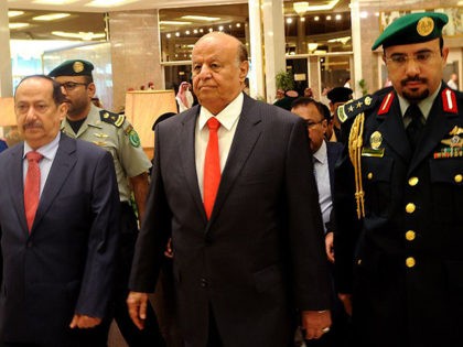 Yemen's exiled President Abed Rabbo Mansour Hadi (C) arrives for the opening of "Riyadh Conference for Saving Yemen and Building Federal State" in the Saudi capital Riyadh, on May 17, 2015. The Huthis, who are fighting forces loyal to Hadi and have seized large parts of the country including the …