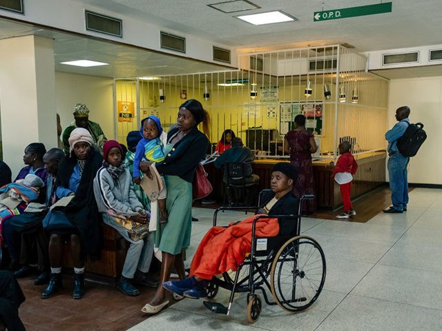 People wait for medical treatment at Parirenyatwa hospital in Harare September 9, 2019. -