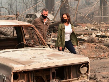 US Democratic vice presidential nominee and Senator from California, Kamala Harris and California Governor Gavin Newsom visit the scene of fire-ravaged property from the Creek Fire across from Pine Ridge Elementary School in an unincorporated area of Fresno, California on September 15, 2020. (Photo by Frederic J. BROWN / AFP) …
