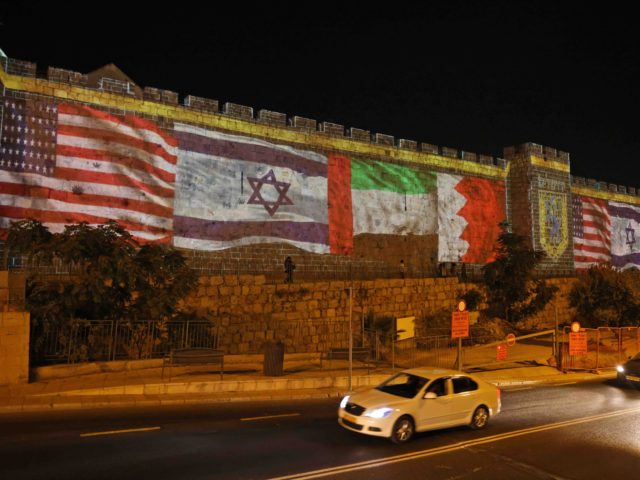 Jerusalem flags on walls (Menahem / AFP / Getty)