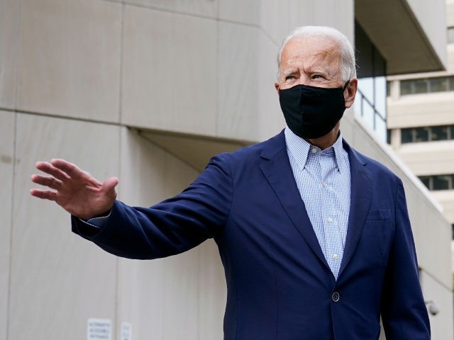 emocratic presidential candidate and former Vice President Joe Biden departs after voting early in Delaware's state primary election at the New Castle County Board of Elections office in Wilmington, Del., Monday, Sept. 14, 2020. (AP Photo/Patrick Semansky)