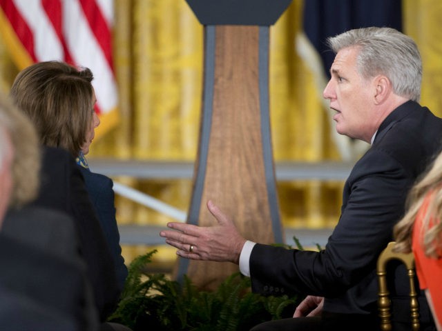 House Majority Leader Kevin McCarthy of Calif., right, talks with House Minority Leader Nancy Pelosi of Calif. as they wait for start of a ceremony where President Barack Obama honored the 2015 NBA Champions Golden State Warrior basketball, Thursday, Feb. 4, 2016, in the East Room of the White House …