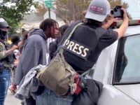Protesters March Through the Streets Following