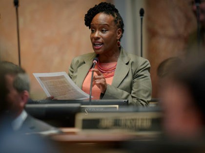 Kentucky Democratic State Representative Attica Scott speaks on the floor of the House of Representatives at the Capitol in Frankfort, Ky., Wednesday, March 2, 2020. (AP Photo/Bryan Woolston)