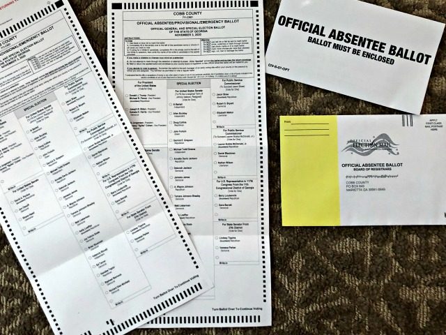 Absentee ballots are seen, Saturday, Sept. 26, 2020, in Cobb County, Ga. (AP Photo/Mike Stewart)