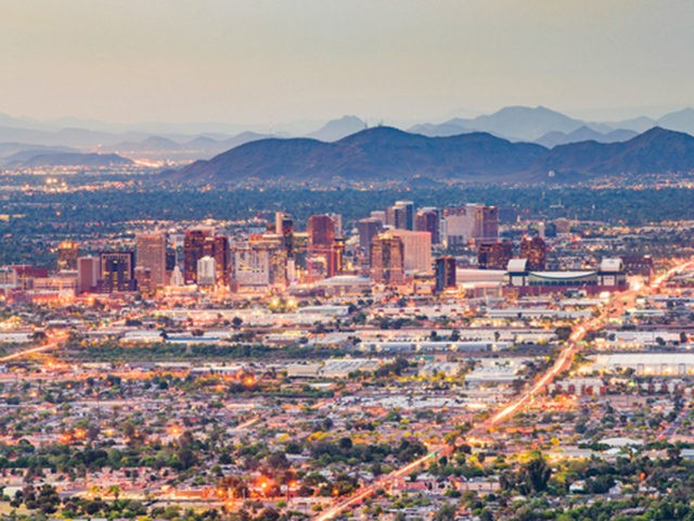 Phoenix, Arizona, USA downtown cityscape from above at dusk.