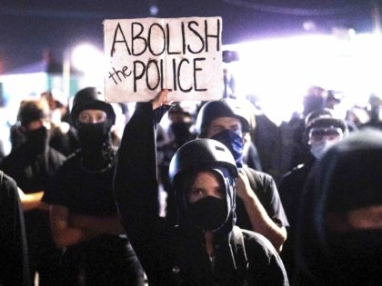 Portland protester (Noah Berger / Associated Press)