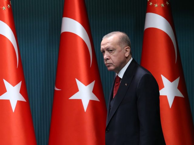 President of Turkey, Recep Tayyip Erdogan arrives to give a press conference after the cab