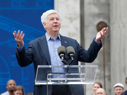 DETROIT, MI - JUNE 19: Michigan Governor Rick Snyder speaks at a press conference where the Ford Motor Company announced its plans to renovate the historic, 105-year old Michigan Central train station and Detroit's Corktown neighborhood into a hub for Ford's auto technology on June 19, 2018 in Detroit, Michigan. …