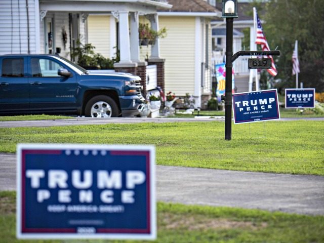"Trump-Pence" signs and banners are seen on a street in Olyphant, just outside Scranton, P