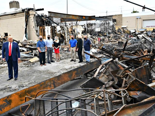 US President Donald Trump tours an area affected by civil unrest in Kenosha, Wisconsin on September 1, 2020. - Trump said Tuesday on a visit to protest-hit Kenosha, Wisconsin that recent anti-police demonstrations in the city were acts of "domestic terror" committed by violent mobs. "These are not acts of …
