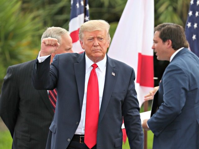 JUPITER, FLORIDA - SEPTEMBER 08: President Donald Trump gestures as he leaves after speaking about the environment during a stop at the Jupiter Inlet Lighthouse on September 08, 2020 in Jupiter, Florida. President Trump announced an expansion of a ban on offshore drilling and highlighted conservation projects in Florida. President …