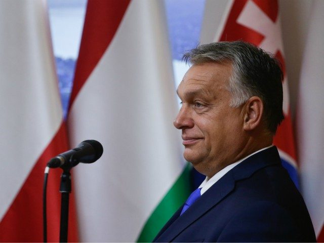 Hungarian Prime Minister Viktor Orban speaks during a press conference with his Polish and Czech counterparts at the Polish permanent representation in Brussels on September 24, 2020 after talks with top EU officials as the bloc tries to reform asylum rules five years after the continent was engulfed by a …