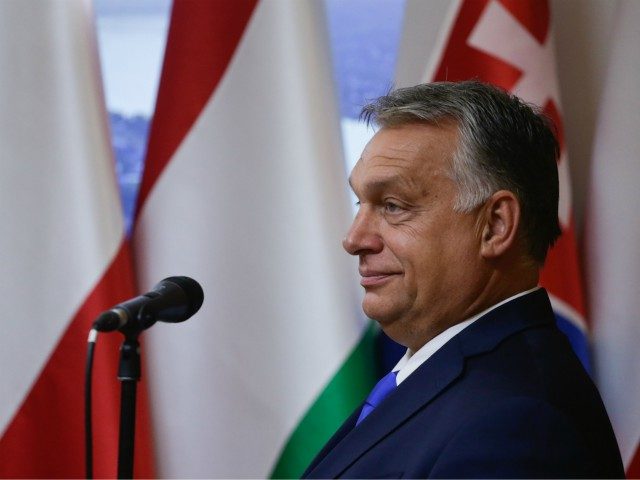 Hungarian Prime Minister Viktor Orban speaks during a press conference with his Polish and