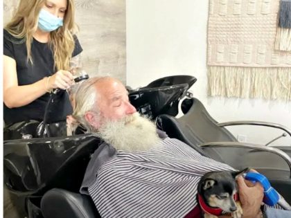 Wildfire Victim Gets Hair Done with Dog in Lap