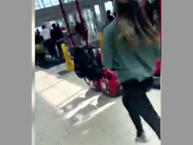 Woman Running from Mall Shooting