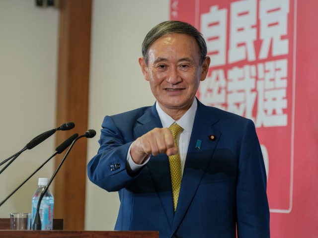 Newly elected head of Liberal Democratic Party Yoshihide Suga gestures before a press conf
