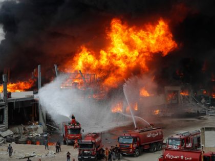 Fire burns in the port in Beirut, Lebanon, Thursday, Sept. 10. 2020. A huge fire broke out