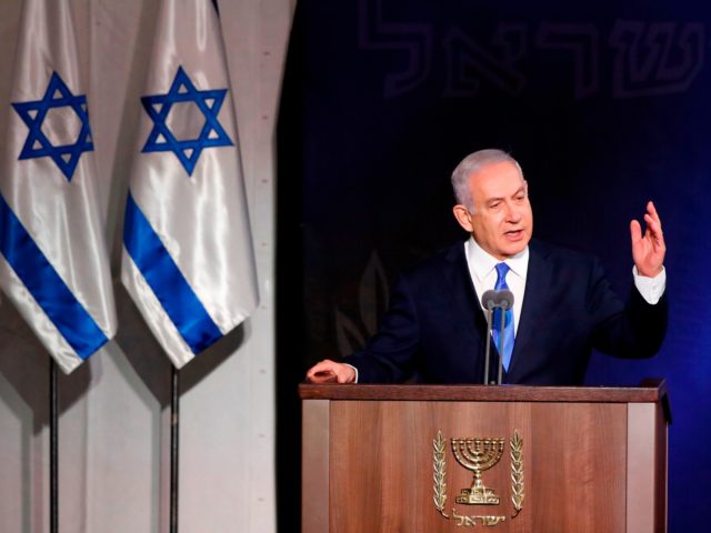 Israeli Prime Minister Benjamin Netanyahu speaks during a handover ceremony for the new Is
