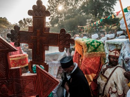 Ethiopian Orthodox Christians take part in the celebration of Timkat, the Ethiopian Epiphany, in Gondar, on January 19, 2020. - Timkat is the Ethiopian Orthodox Christian festival which celebrates the baptism of Jesus in the Jordan river. (Photo by EDUARDO SOTERAS / AFP) (Photo by EDUARDO SOTERAS/AFP via Getty Images)