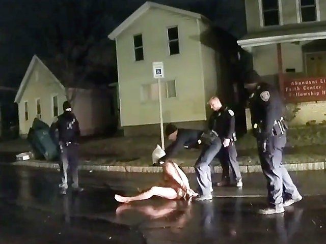 In this image taken from police body camera video provided by Roth and Roth LLP, Rochester police officers hold down Daniel Prude on March 23, 2020, in Rochester, N.Y. Prude, a Black man who had run naked through the streets of the western New York city, died of asphyxiation after …