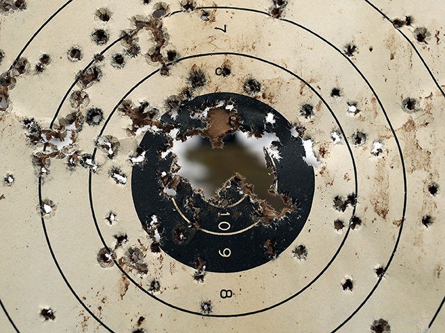 WALLINGFORD, CT - FEBRUARY 24: A shooitng target is full of bullet holes at a class taught by King 33 Training at a shooting range on February 24, 2013 in Wallingford, Connecticut. King 33 Training, a company that trains and educates individuals on the safe and proper use of guns …