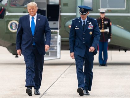 President Donald J. Trump disembarks Marine One at Joint Base Andrews, Md. Thursday, Sept.