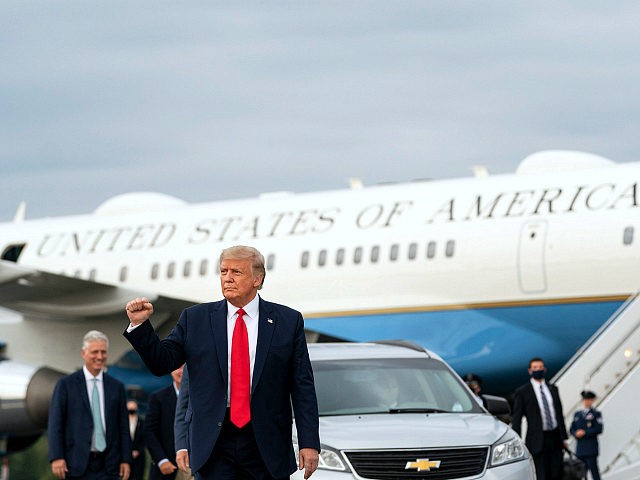 President Donald J. Trump gestures with a fist pump as he disembarks Air Force One Tuesday, Sept. 8, 2020, at the Greensboro/High Point Airport for his visit to Winston-Salem, N.C. (Official White House Photo by Joyce N. Boghosian)