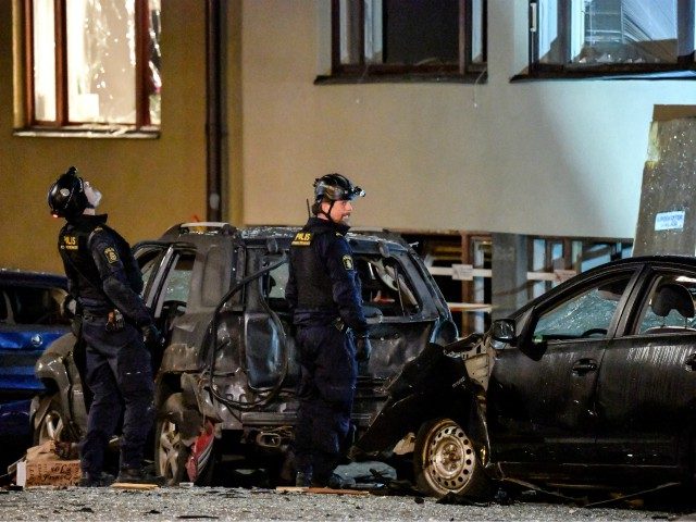 Police work at the site where an explosion damaged a residential building in central Stockholm on January 13, 2020. - Several nearby cars were also damaged by the blast, the cause of which was not known, in the affluent neighbourhood of Ostermalm. (Photo by Anders WIKLUND / various sources / …
