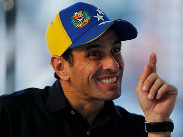 FILE - In this Feb. 25, 2014 file photo, opposition leader Henrique Capriles points during