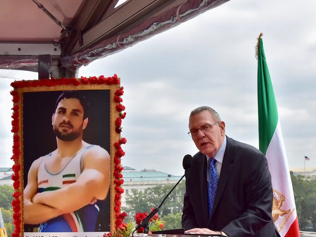 The free Iran summit included a memorial to Navid Afkari, an Iranian wrestler who was executed for protesting against the Iranian regime. (Penny Starr/Breitbart News)