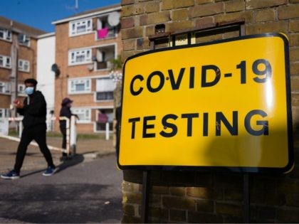 LONDON, UNITED KINGDOM - SEPTEMBER 18: Signs direct members of the public to a COVID-19 te