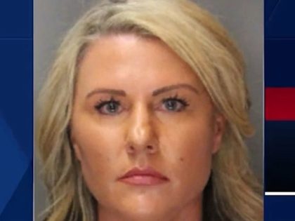 A former California sheriff's deputy was sentenced Wednesday after she pleaded guilty to h