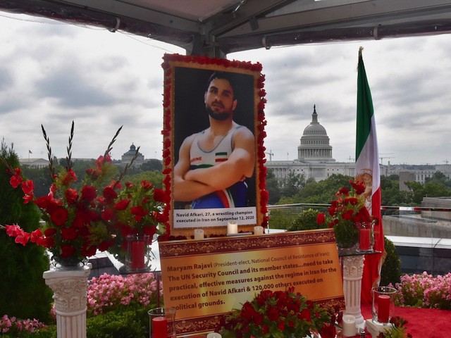 The free Iran summit included a memorial to Navid Afkari, an Iranian wrestler who was executed for protesting against the Iranian regime. (Penny Starr/Breitbart News)
